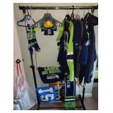 1st Bedroom Right:  Seahawks, shirts, Jackets,  Mariners Sweatshirt w/Hood , "Blitz" Puppet