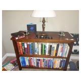 TV Room:  Wood Book Case, Books--Running, Scuba Diving, Hiking, Camping