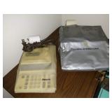 Office Room Right: Sears Adding Machine, Olympia Internation Adding Machine