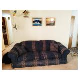 Living Room: Blue Couch, Japanese Pictures, Parrots