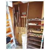 Garage Right: Aluminum Tall Ladder, Garden Tools, Painting Stuff