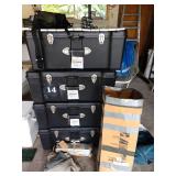 Garage Right: 4 Storage or Shipping Trunks, Another Tent