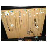 Living Room:  Costume Jewelry Necklesses (No Gold)