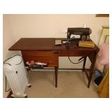 1st Bed Room Left:  Kenmore Sewing Machine, Heater