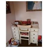 2nd Bedroom Left:   White Desk, Art Books, etc