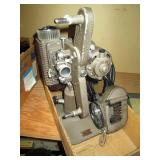 Garage:  Revere 8 mm Projector & 8mm Movie Camera