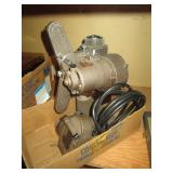 Garage:  Revere 8 mm Projector & 8mm Movie Camera