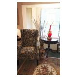 Living Room:  Nice Chair, Round Table Ruby Red High End Lamp