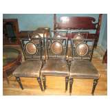 6 leather covered chairs