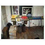 Bed Room 3 Suit cases--Singer sewing table, Singer box tops, Games, Nice formica table