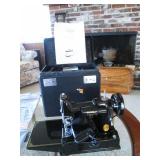 Singer 221 sewing  machine w/case & some attachments