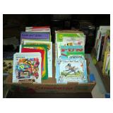 The lady was a teacher at Greenwood elementary school. Books that were used for teaching grade schoo