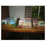 The lady was a teacher at Greenwood elementary school. Books that were used for teaching grade schoo