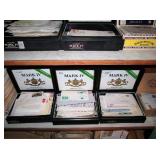 Boxes of envelopes with canceled stamps. 