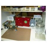 scotch tape, Steel small picture holders w/magnets, Glass jars, Ikea Desk (there are 2)