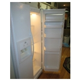 Roper White side by side refrigerator/freezer with water and ice in door