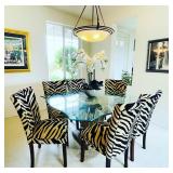 Zebra print dining chairs and glass top dining table