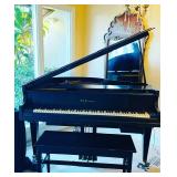 Vintage black baby grand piano