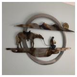 Large burnished metal wall sculpture