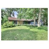 3 Bed Ranch on Full Basement with all-season room overlooking wooded lot