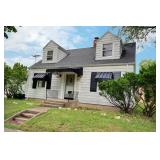 Charming 2 Bed Home in Woodhurst Neighborhood on Full Basement with 2 Car Garage and Loads of Possib