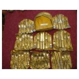 REED AND BARTON GOLD BAROQUE STAINLESS FLATWARE LOOKS TO BE SERVICE FOR 8 PLEASE PREVIEW.