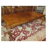 DINING ROOM TABLE MADE BY THE HOOKER FURNITURE COMPANY MEASURES 86 X 45 X 18 WITH ADDITIONAL LEAF