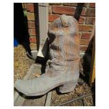 LOOK WHAT BIG TEX LEFT IN OUR GARDEN THE CERAMIC BOOT MEASURES 18” X 9” X 21”