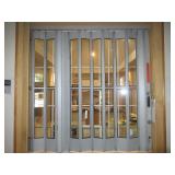 ACCORDION STYLE SECURITY WINDOW AND SECURITY BARS ON REVERSE SIDE MEASURES 72 X 63 EXPERT REMOVAL RE