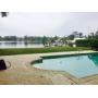China Cat Presents A Riverfront Home in Ortega