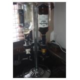 ROTATIG LIQUOR DISPENSER