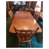 HUGE TABLE WITH 6 CHAIRS AND LEAVES