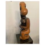 Springstone sculpture by Obert Marime titled Adam and Eve Modest before God