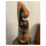 Springstone sculpture by Obert Marime titled Adam and Eve Modest before God