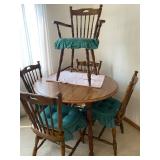 Table with 2 leaves and 6 chairs