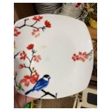 Cherry Blossom design with a blue bird by Fisher Dinnerware