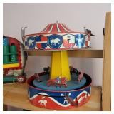 ANTIQUE METAL MERRY GO ROUND