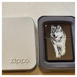 Zippo lighter with a wolf design