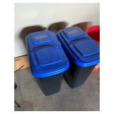 Kingsford Charcoal dispenser black with blue lid full of charcoal