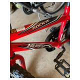 Huffy 16" "Rock it" bicycle in red with training wheels