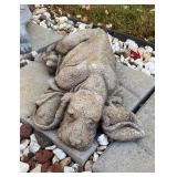Concrete garden statue of a dog