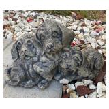 Concrete garden statue of a dogs
