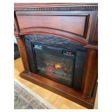 Electric Fireplace - Heater with a wooden Mantel