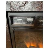 Electric Fireplace - Heater with a wooden Mantel