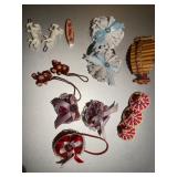 Collection of various hair accessories including barrettes and hair ties with bows and decorative el