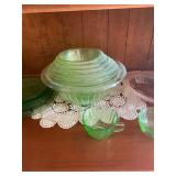 Set of 7 Vintage Green Glass Nesting Bowls. Rolled rim.