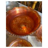 Fenton Butterfly and Berry pattern marigold carnival glass bowl, likely dating from the early 20th c