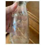  vintage half-pint glass milk bottles from the Dairy Container Corporation. 