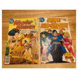 The image displays two vintage DC comic books.  The comic on the left is Wonder Woman #232, publishe