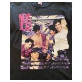 a vintage 1990s New Kids on the Block The Magic Summer Tour black t-shirt.  size large 42-44